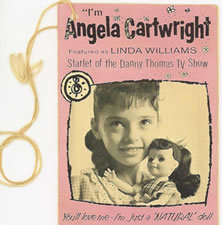 The tag on the doll.
