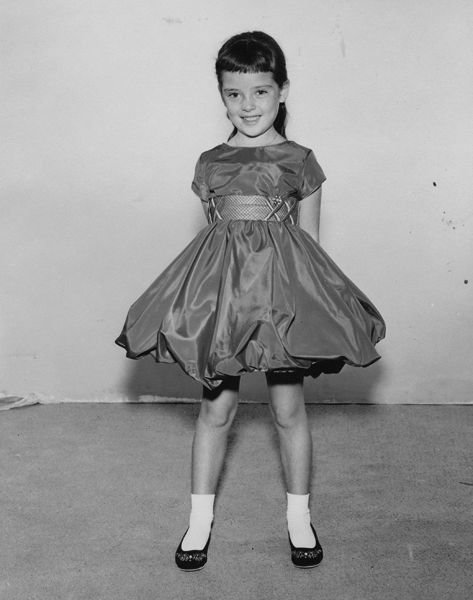 I did love wearing these poufy dresses. This one was red.