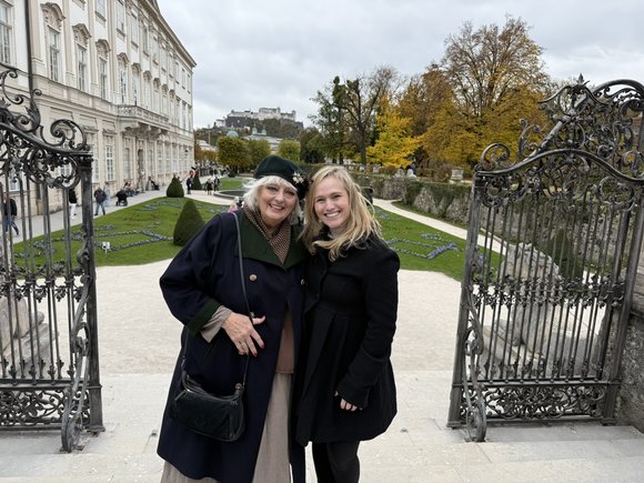 At the top of the stairs in Maribel Gardens with daughter Becca.