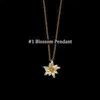* 22k gold, bronze, 22k white gold leaf, Austrian crystal * 16" - 18" adjustable chain