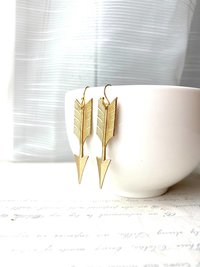 Arrow earrings & AC art